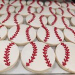 Gluten-free vegan shortbread cookies decorated like baseballs.