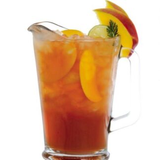 a pitcher of iced tea with slices of mango